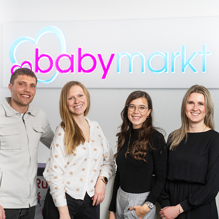 Teamfoto van collega's bij babymarkt.de